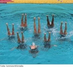 Imagem de uma presentao de quatro atletas do Nado Sincronizado.  <br> <br>  Palavras-chave: esporte, nado sincronizado, natao.