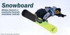 Imagem de um atleta de snowboard praticando uma manobra area. <br><br> Palavras-chave: esporte, esportes de inverno, snowboard. 